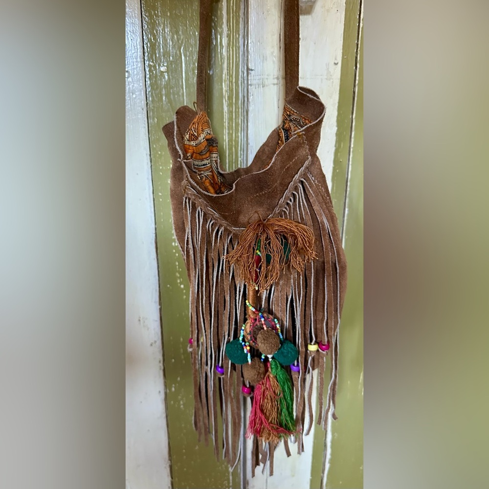Free People cross body, thigh length purse